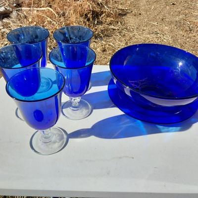 BLUE GLASS SERVING BOWL AND DRINKING GLASSES
