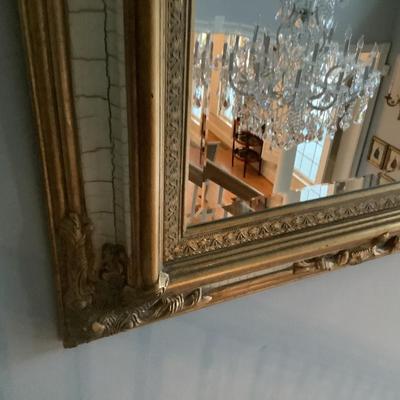 Beveled ornately gold crackled framed mirror 48"H 36"W