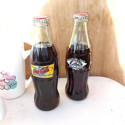 COLLECTABLE COKE BOTTLES AND MUGS