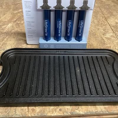 Legend cast iron griddle and NIB lifestraws, personal water filters