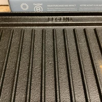 Legend cast iron griddle and NIB lifestraws, personal water filters