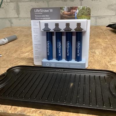 Legend cast iron griddle and NIB lifestraws, personal water filters
