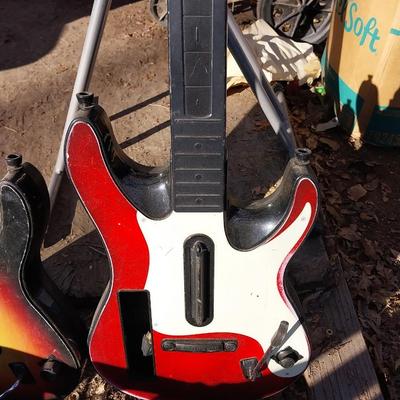 TWO PLAYSTATION GUITARS