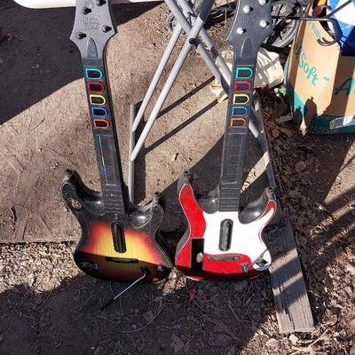 TWO PLAYSTATION GUITARS