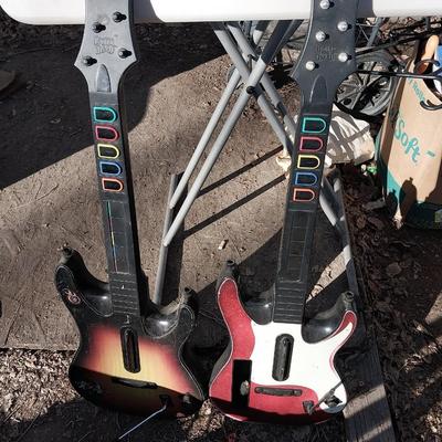 TWO PLAYSTATION GUITARS