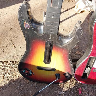 TWO PLAYSTATION GUITARS