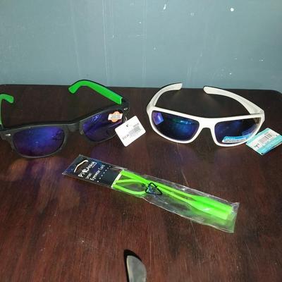 NEW SUNGLASSES WITH TAGS AND EYEWARE CORD