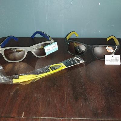 NEW SUNGLASSES WITH TAGS AND EYEWARE CORD