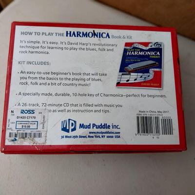 HARMONICA IN BOX AND PAINTED BRASS BELL