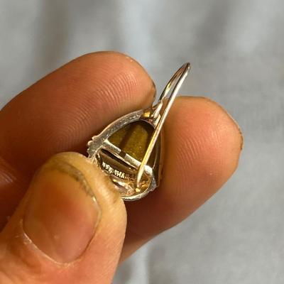 Sterling silver dangle earrings with tigers eye stone.