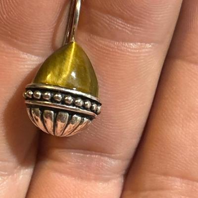 Sterling silver dangle earrings with tigers eye stone.