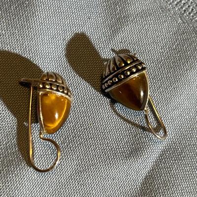 Sterling silver dangle earrings with tigers eye stone.