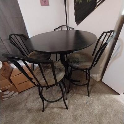 BLACK WROUGHT IRON BASE AND FRAME CAFE STYLE TABLE AND FOUR CHAIRS