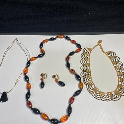 1- Black/gold necklaces