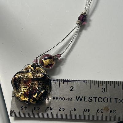 Handblown glass pendant on necklace with sterling silver clasp