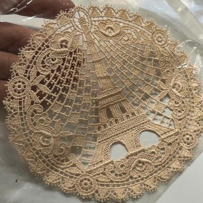 Antique Handmade Doily with Eiffel Tower image.