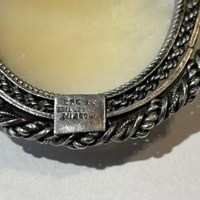 Vintage Sterling Silver Bezel Cameo Pin Made in Palestine in Good Preowned Condition.