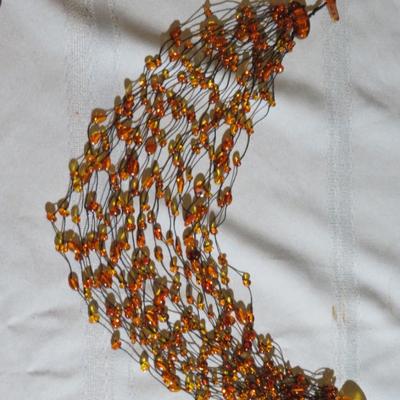 Multi strand Amber Bead Long Necklace.
