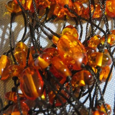 Multi strand Amber Bead Long Necklace.