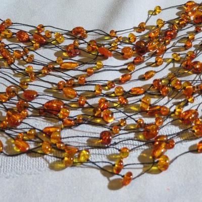 Multi strand Amber Bead Long Necklace.