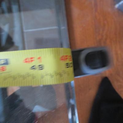 Glass top coffee table - Metal base with grape motif.