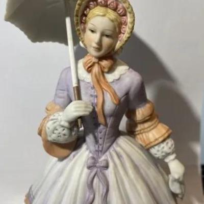 Vintage Lenox Springtime Promenade Porcelain Figurine in Good Preowned Condition.