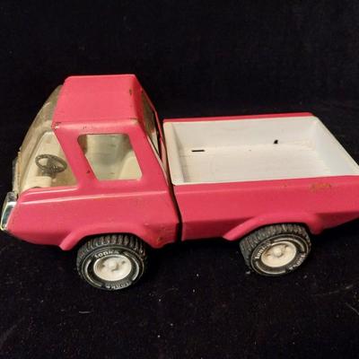 PINK AND BLUE TONKA TOY TRUCKS