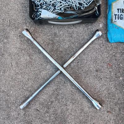 TIRE CHAINS AND A 4 WAY LUG WRENCH