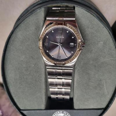 Citizen Eco-Drive Stainless Steel Diamond Bezel Unisex Watch E110-S001421 with Box