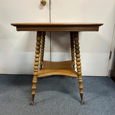 ANTIQUE OAK TABLE WITH SPIRAL LEGS, CLAW FEET WITH MARBLE TIPS AND VINTAGE LADDER BACK CHAIR
