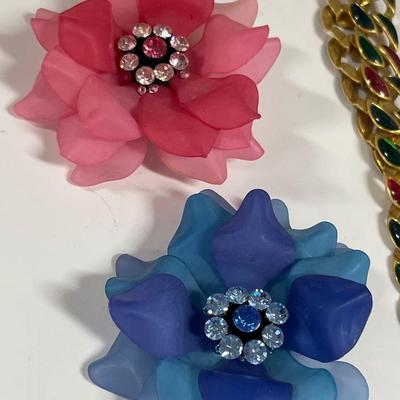 Faux pearls and vintage flower brooches