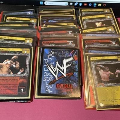 Lot of 135 Holdered WWF Wrestling Cards Preowned from an Estate.