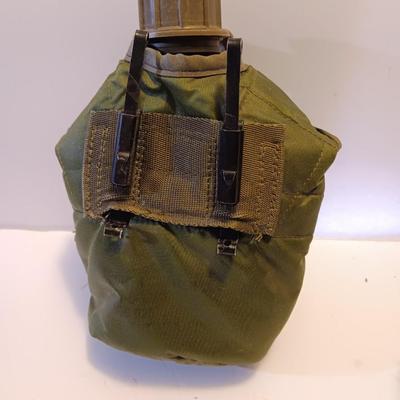 Survival Must haves - folding shovel with storage bag, Canteen with cooler pouch - and a Bushnell monocular