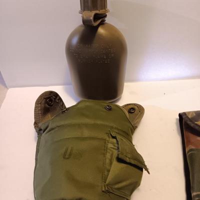 Survival Must haves - folding shovel with storage bag, Canteen with cooler pouch - and a Bushnell monocular
