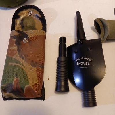 Survival Must haves - folding shovel with storage bag, Canteen with cooler pouch - and a Bushnell monocular