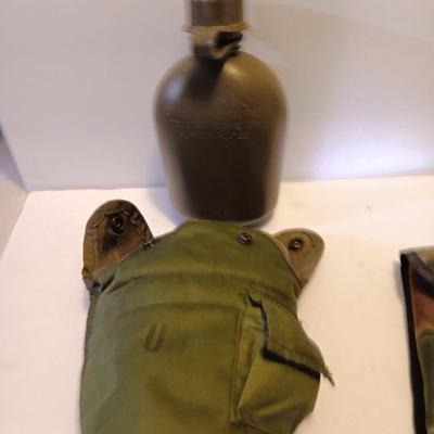 Survival Must haves - folding shovel with storage bag, Canteen with cooler pouch - and a Bushnell monocular