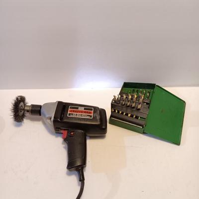 Craftsman electric 3/8-inch variable speed reversible drill with assortment of drill bits