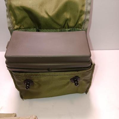 Military issued pouches and bags Ammunition with a canteen and first aid kit.