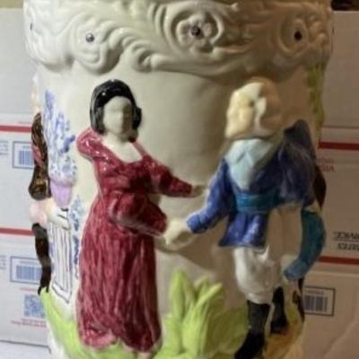 Vintage Ceramic Embossed Handpainted Colonial Theme Umbrella Stand 17.25" Tall in Good Preowned Condition.