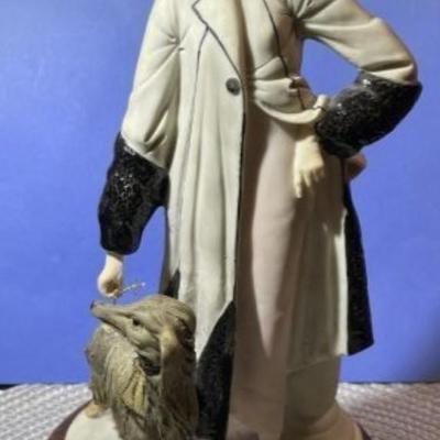 Vintage ROBERTO BRAMBILLO Italian Detailed Hand Painted Lady/Dog Sculpture/Figurine in VG Condition.