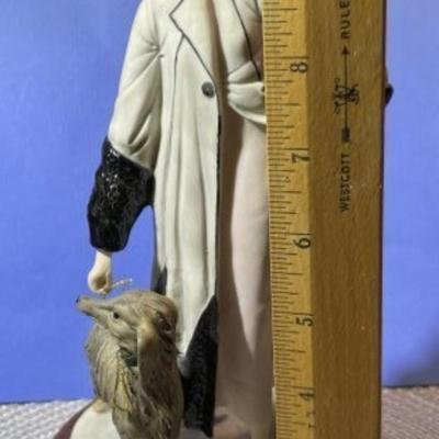 Vintage ROBERTO BRAMBILLO Italian Detailed Hand Painted Lady/Dog Sculpture/Figurine in VG Condition.