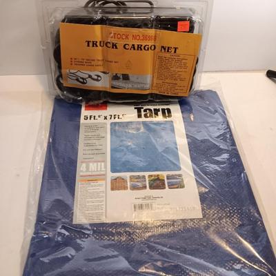 Brand new Truck cargo net with a new 5-foot x 7-foot blue colored tarp