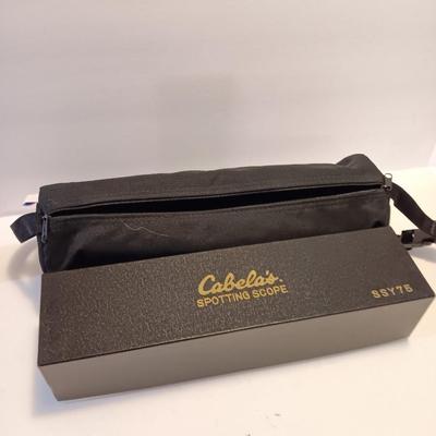 Cabela's non-Armor 75mm SSY76 spotting scope with padded storage case and original box.