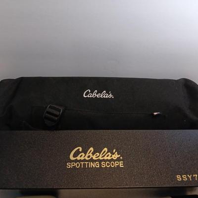 Cabela's non-Armor 75mm SSY76 spotting scope with padded storage case and original box.