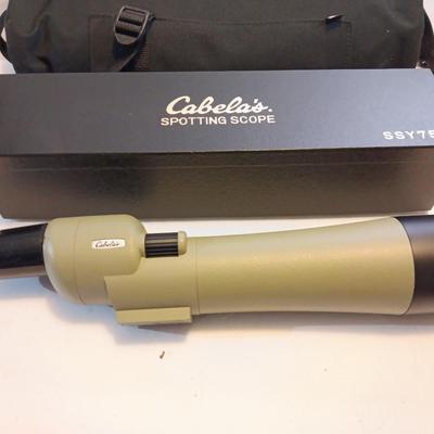 Cabela's non-Armor 75mm SSY76 spotting scope with padded storage case and original box.