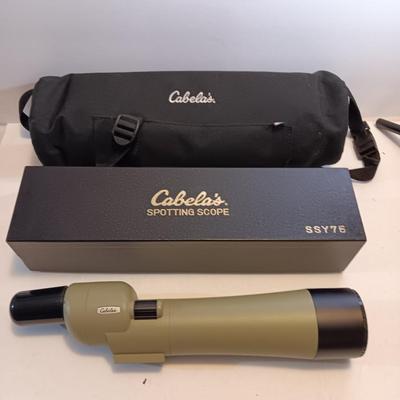 Cabela's non-Armor 75mm SSY76 spotting scope with padded storage case and original box.