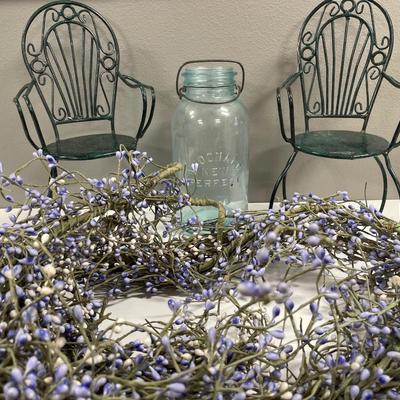 2 small metal doll chairs, glass and purple decor