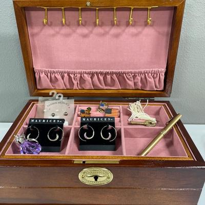 Jewelry box with earrings and pen