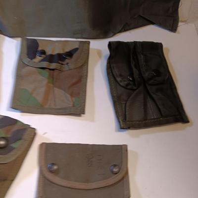 Large lot of Military issued Camouflage bags and pouches and ammunition belts.
