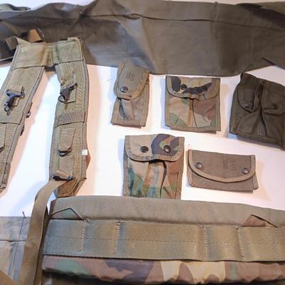 Large lot of Military issued Camouflage bags and pouches and ammunition belts.